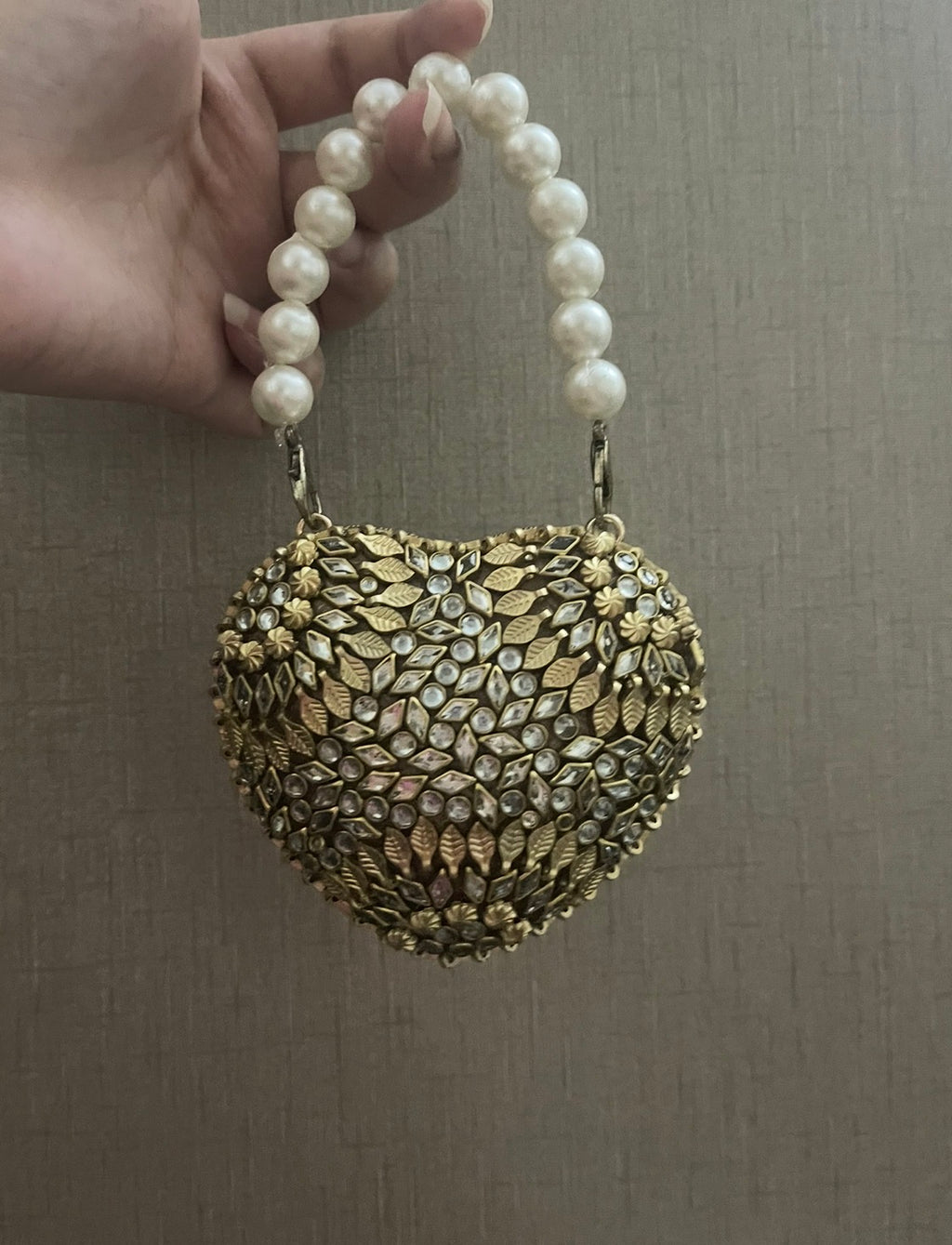Riven kundan bag