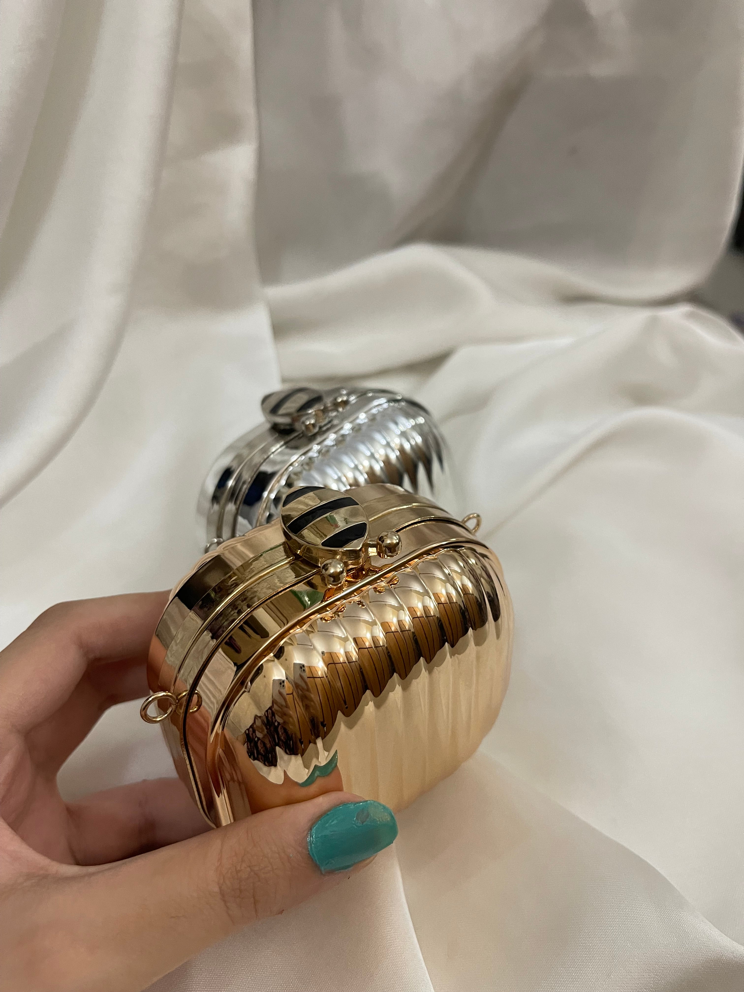 Golden metallic box clutch