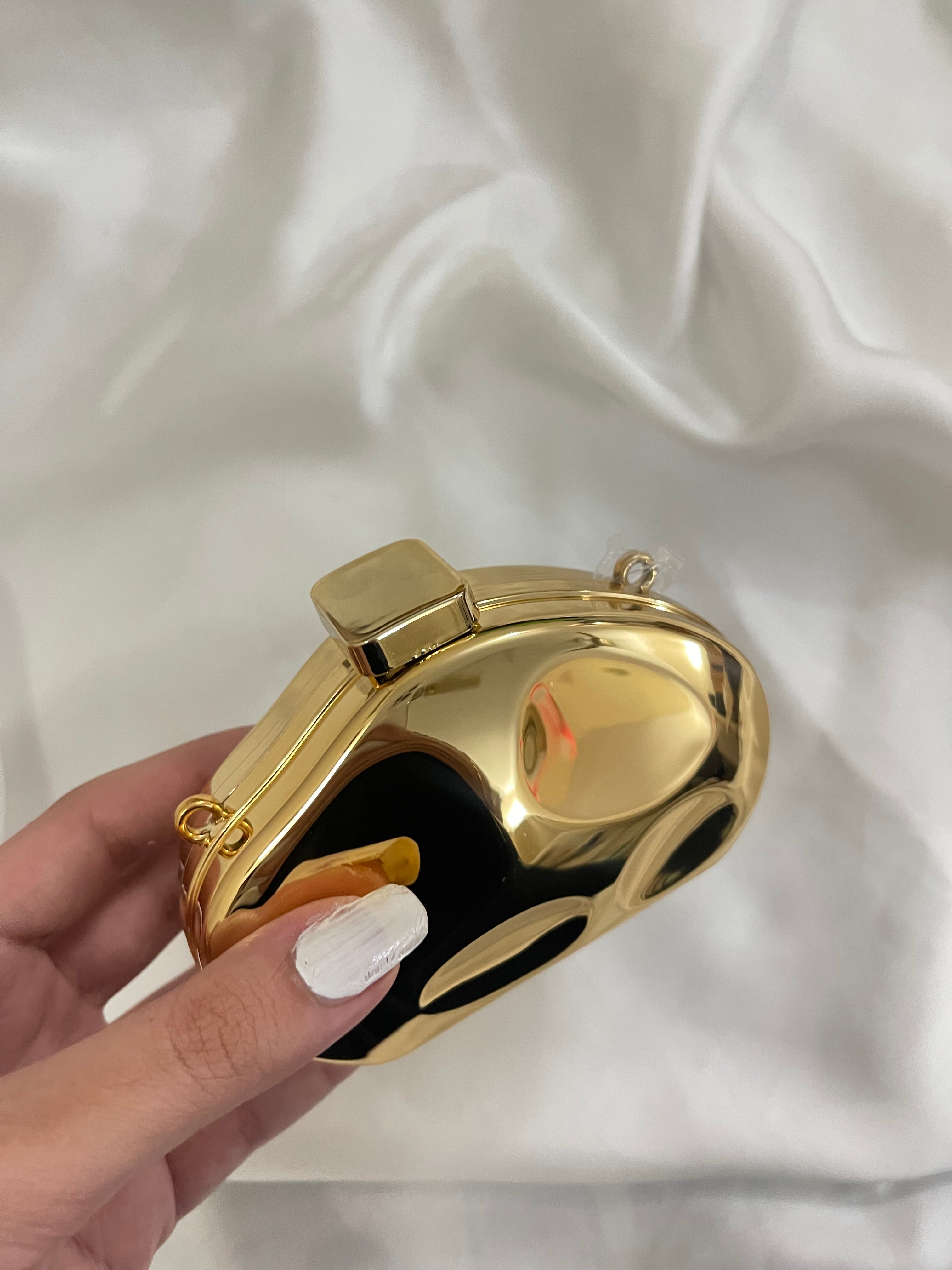 Golden mini design clutch