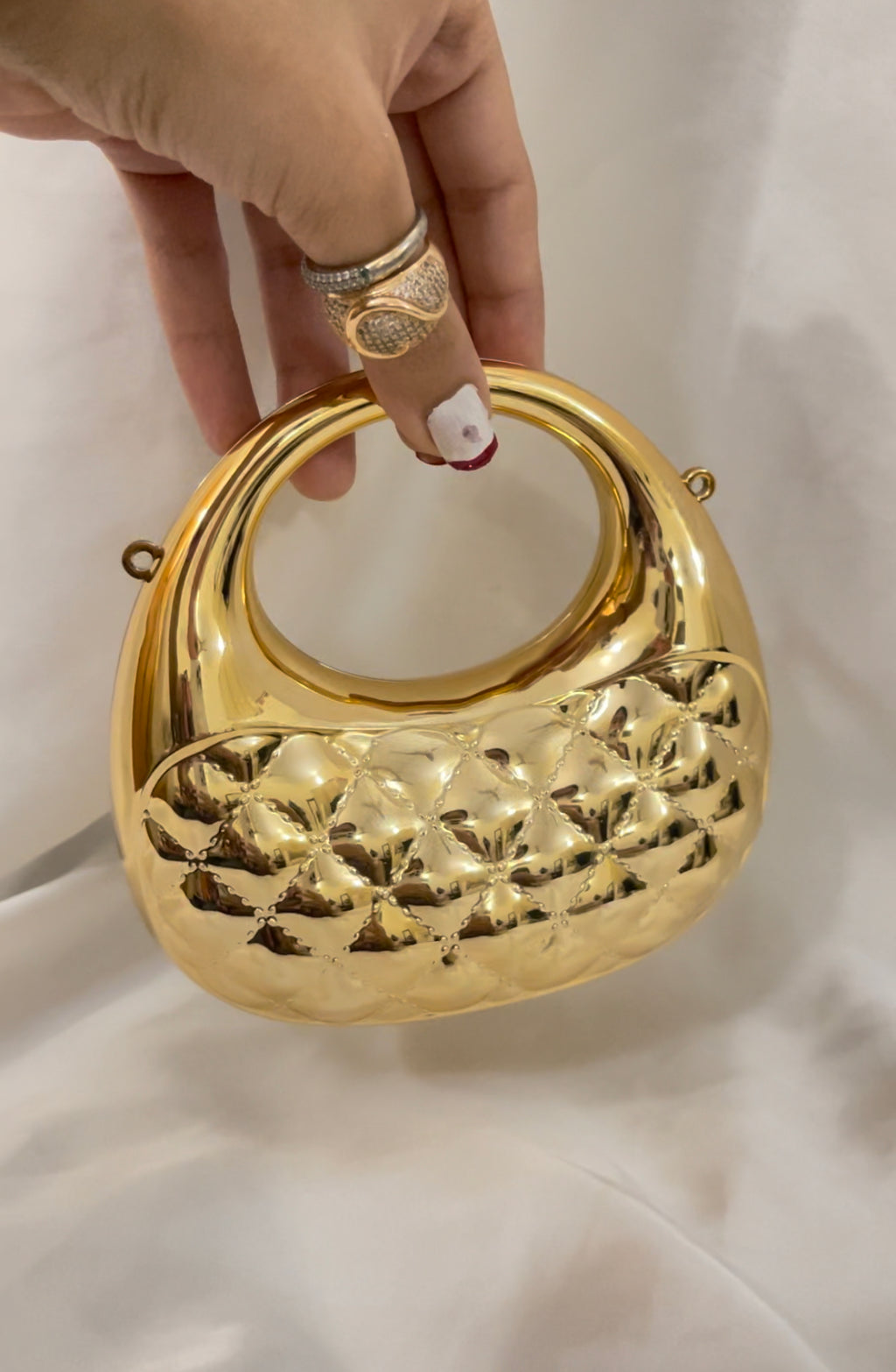 mini patterned clutch
