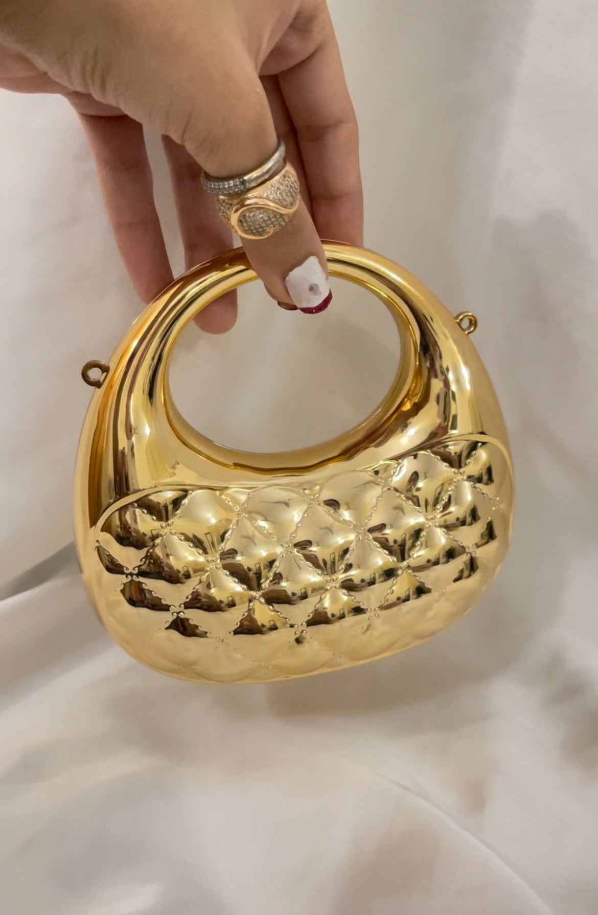 mini patterned clutch