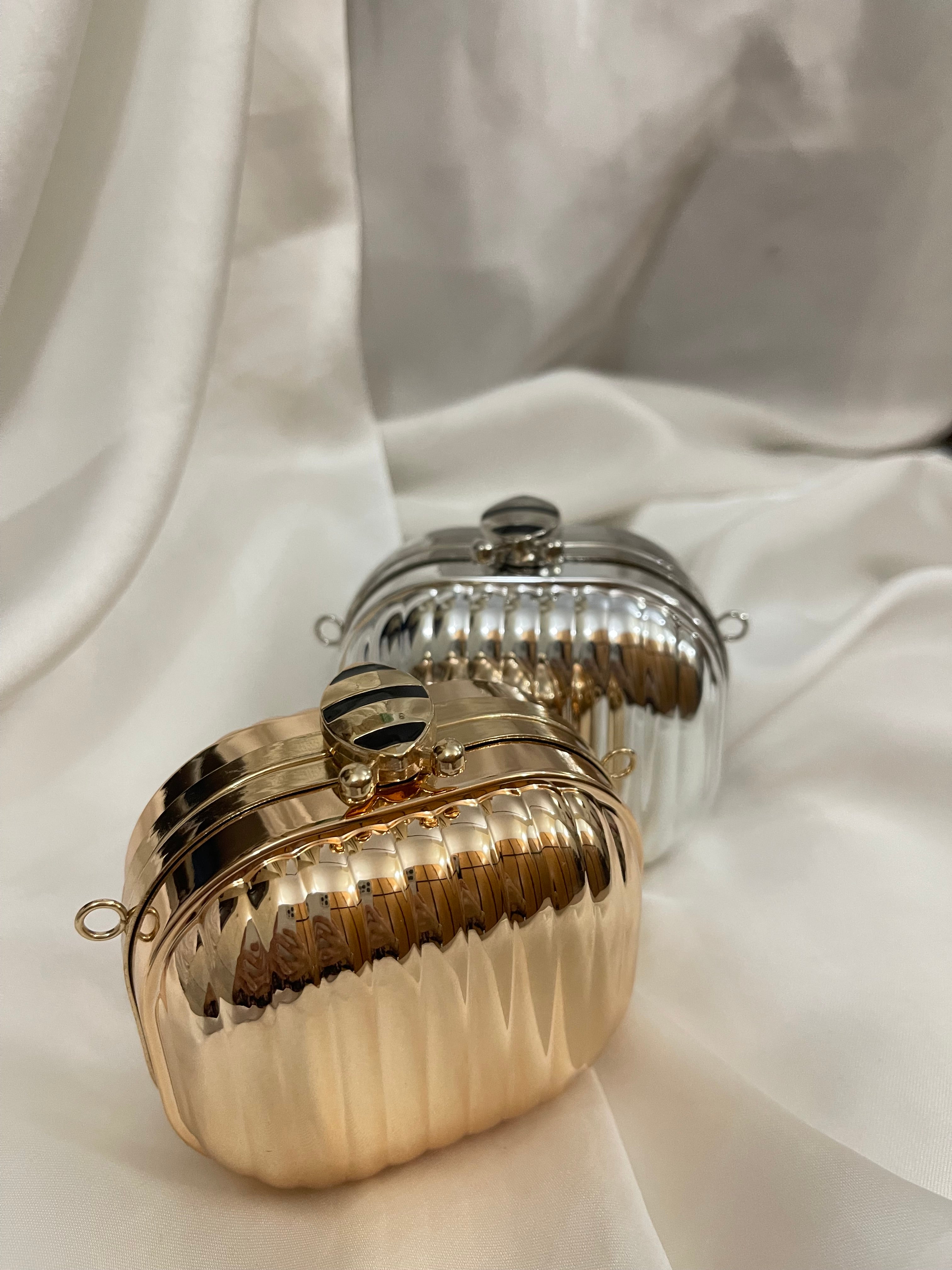 Golden metallic box clutch