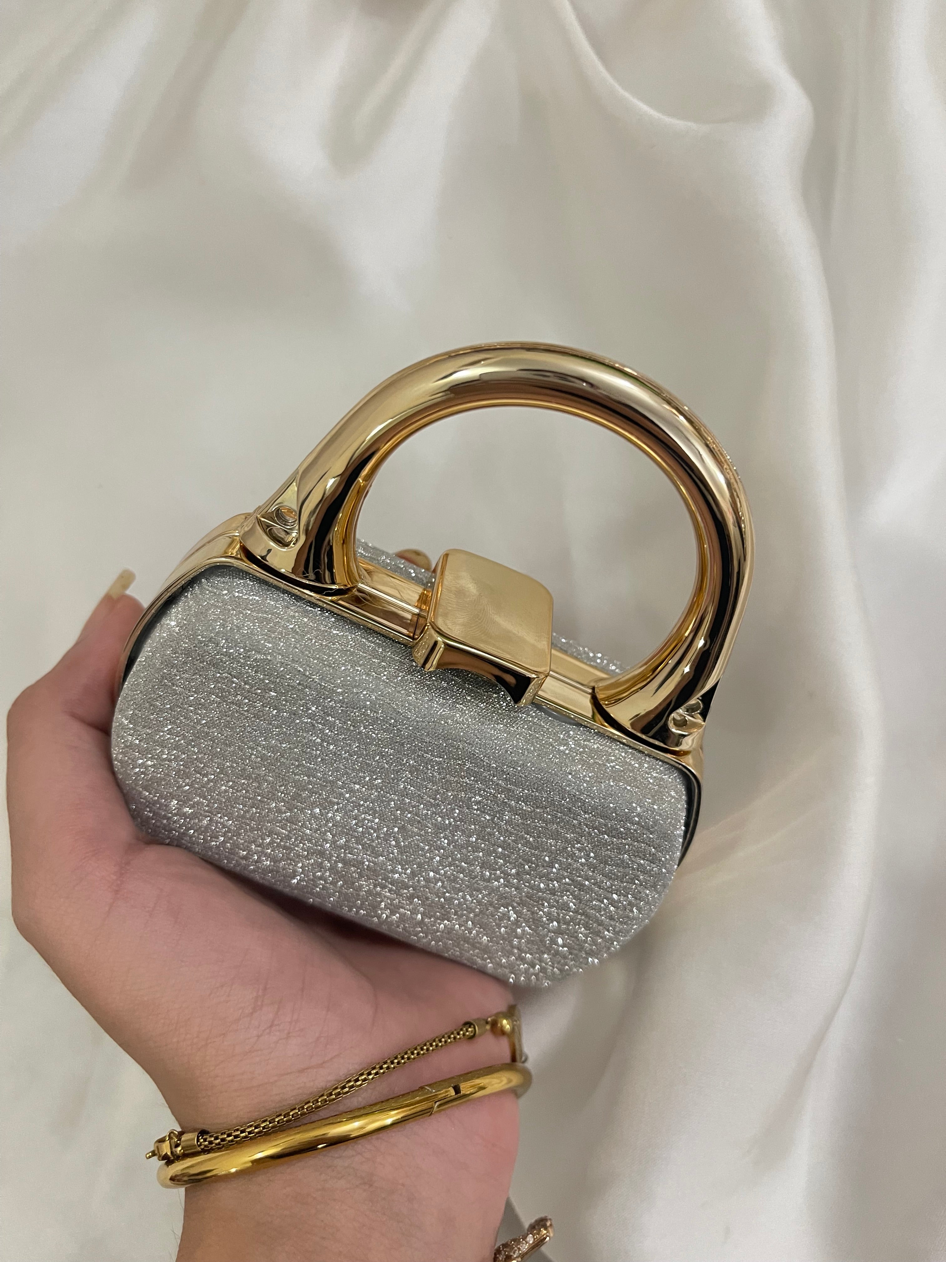 Mini silver clutch