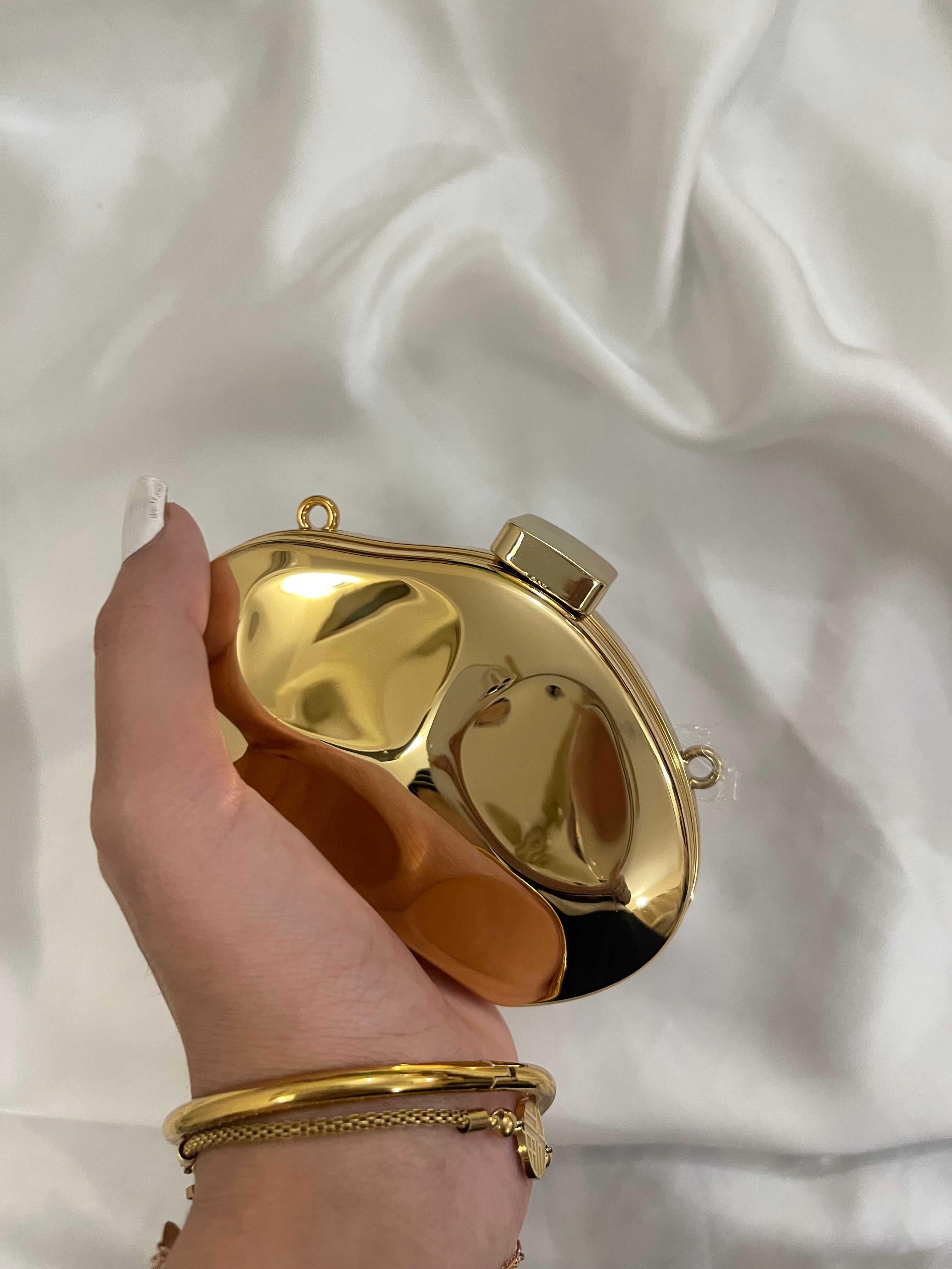 Golden mini design clutch