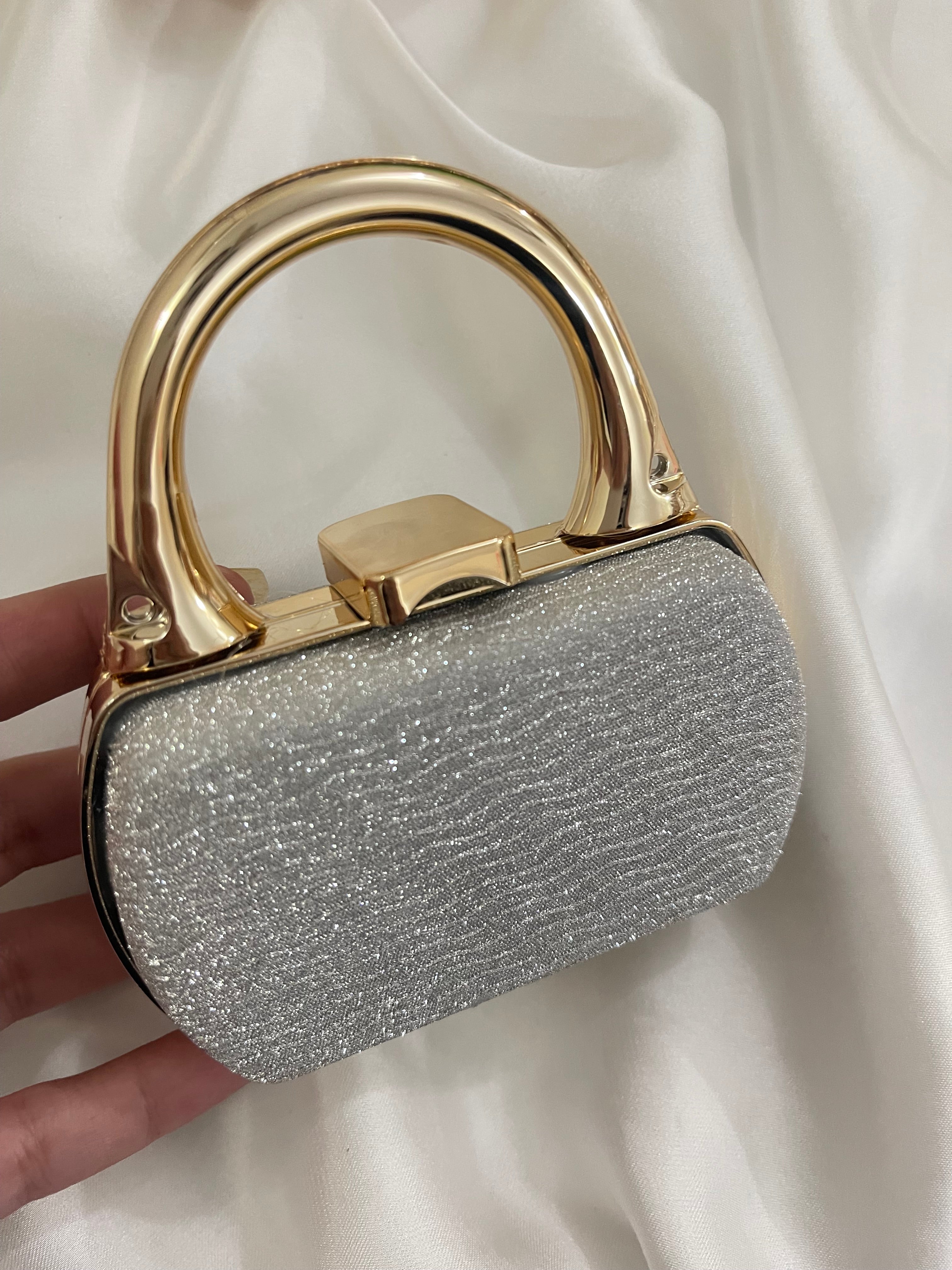 Mini silver clutch