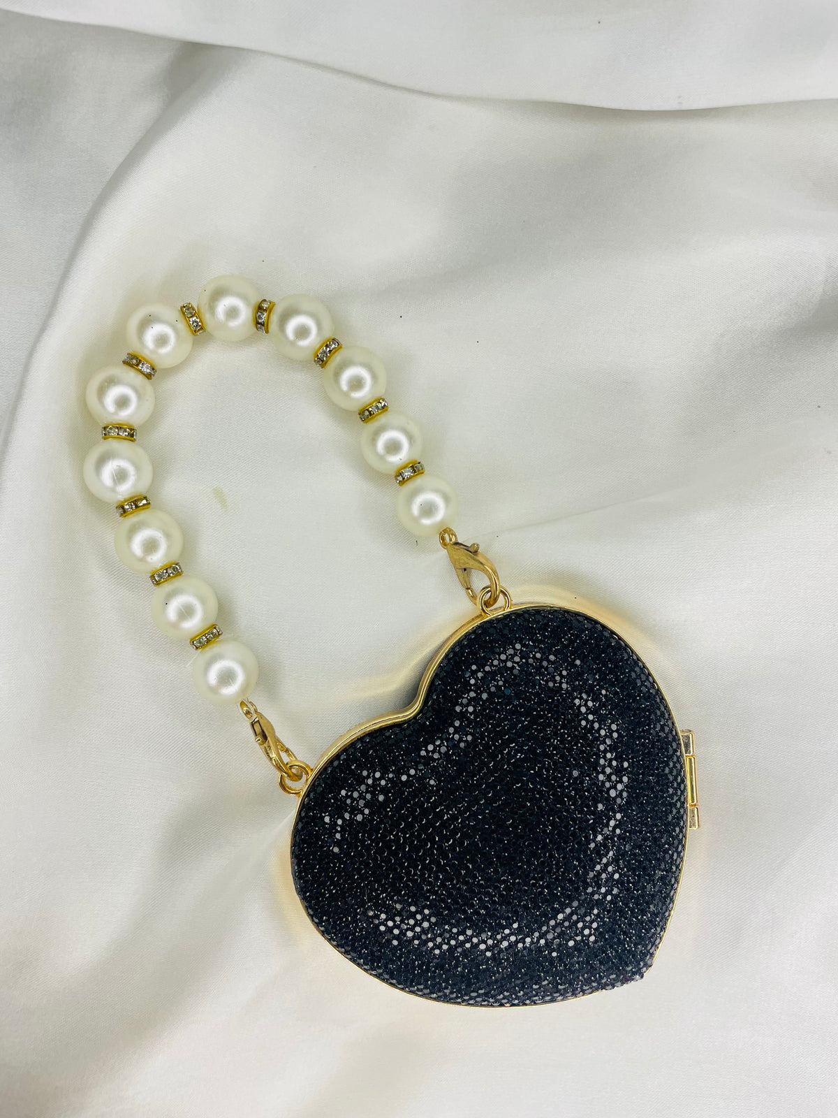 shiny black heart clutch