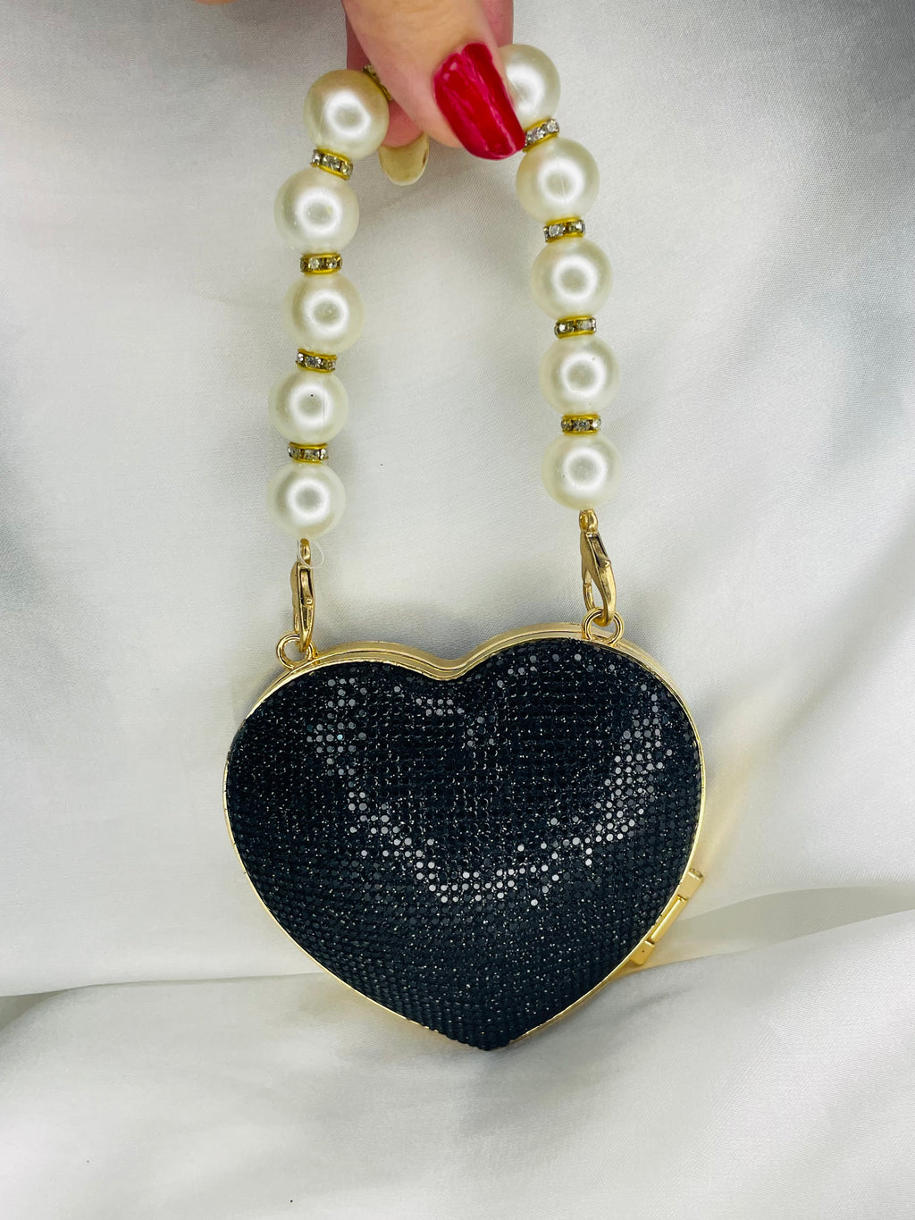 shiny black heart clutch