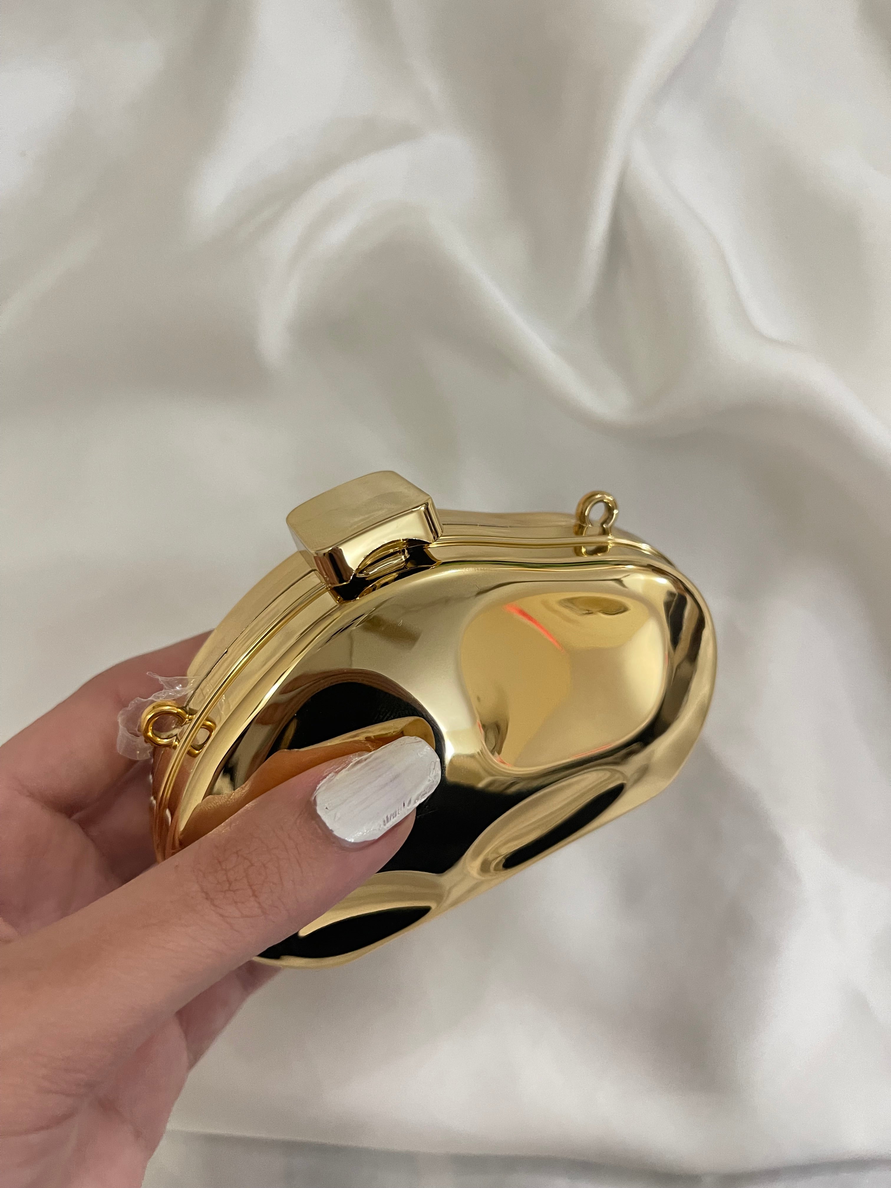 Golden mini design clutch