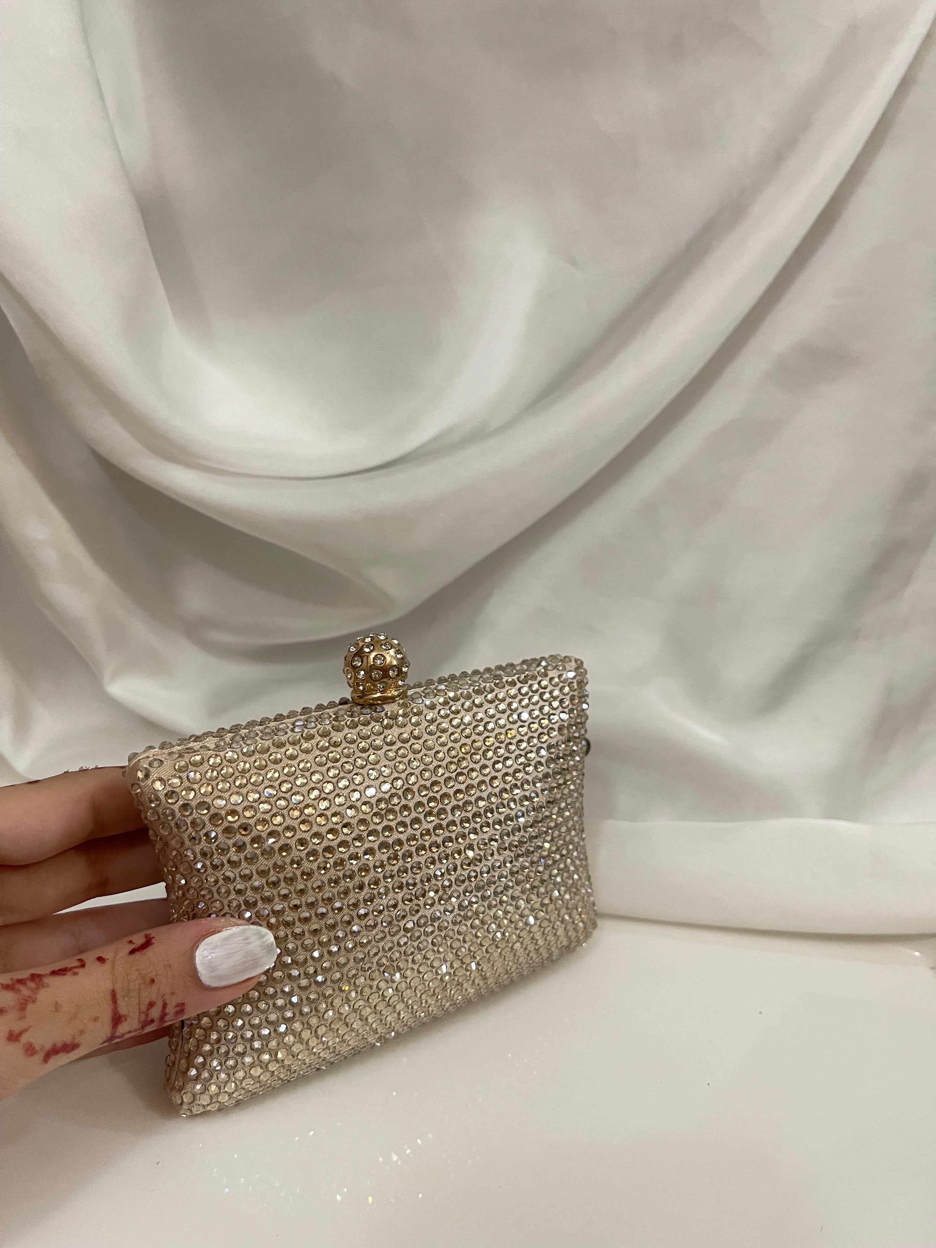 Golden Swarovski clutch