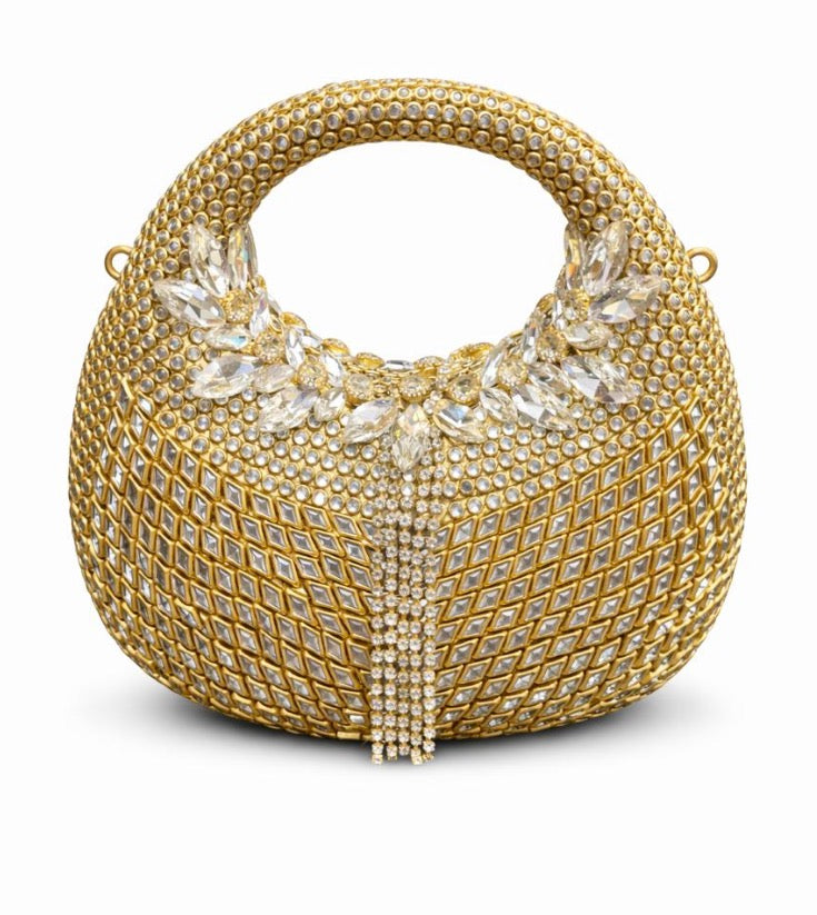 Crescent embellished clutch