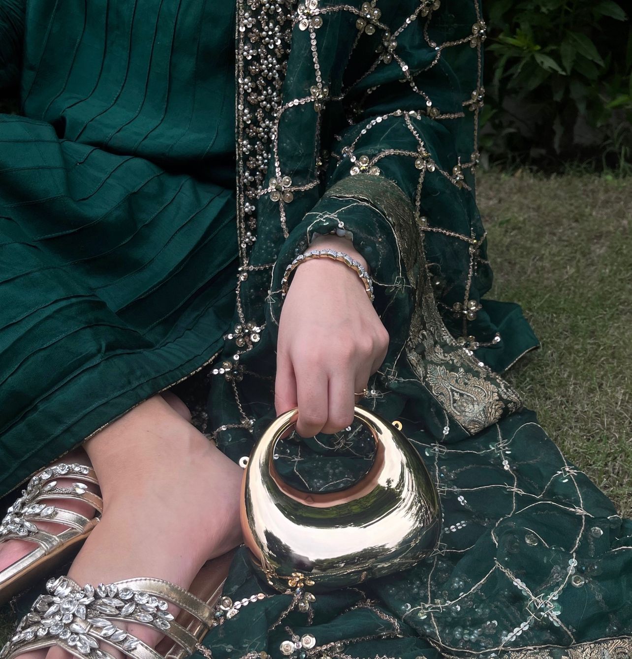 Crescent moon cross body clutch.