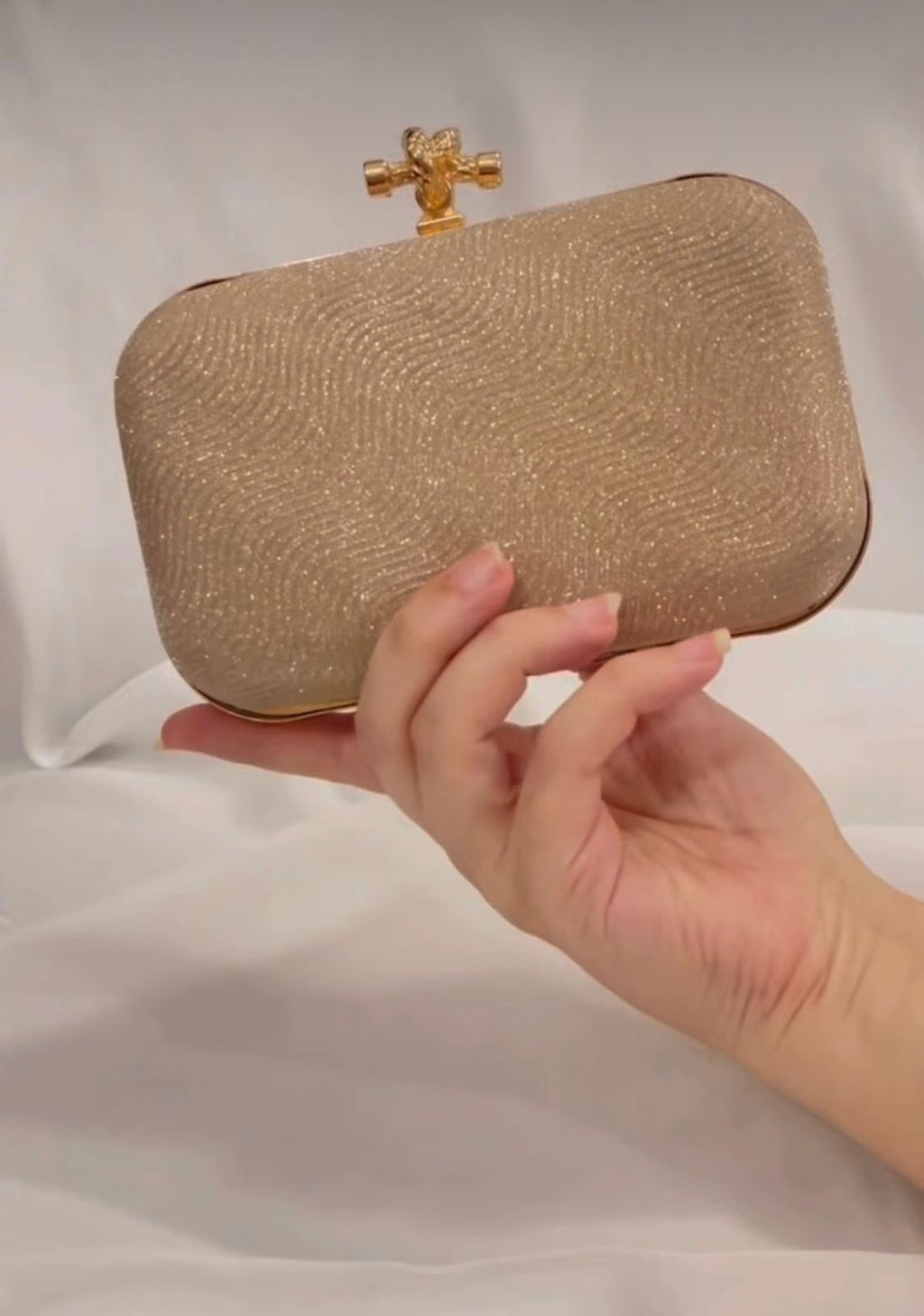 Formal glowy clutch bag