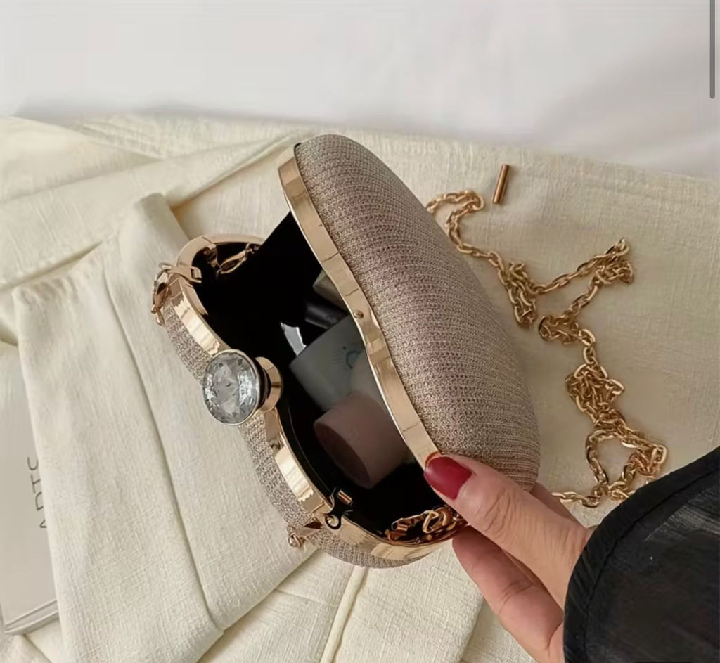 Heart shaped clutch bag