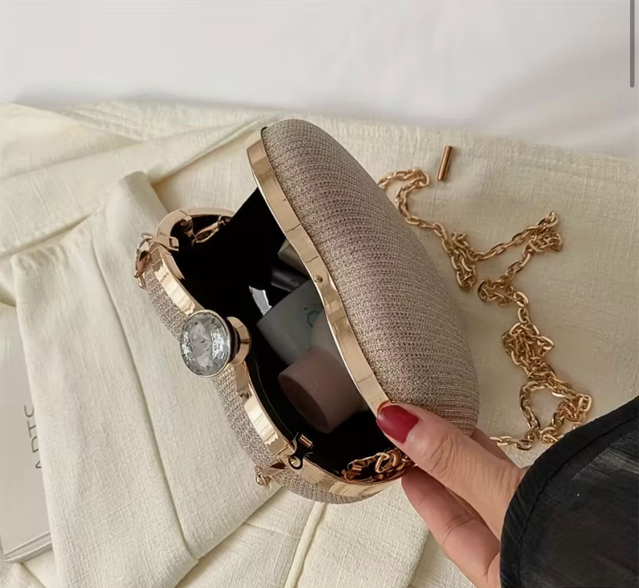 Heart shaped clutch bag